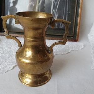 Brass vase in the shape of an amphora. Germany, vintage