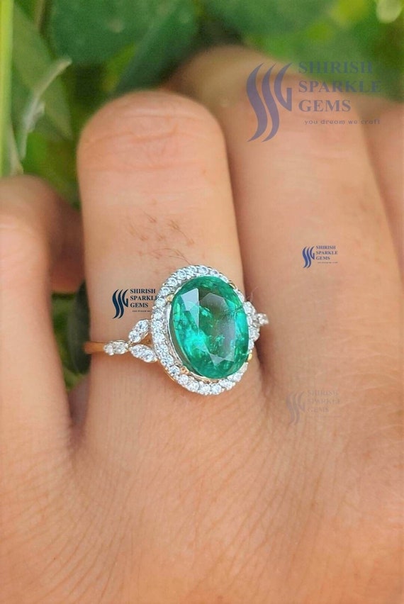 10K White Gold Oval Emerald Ring with Diamond Accent | Parker Jewelers