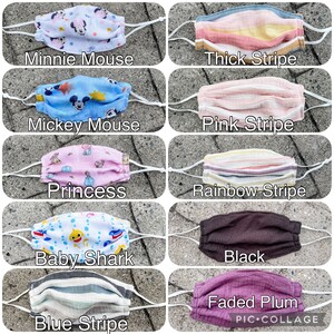 May include: A collage of ten different fabric face masks. The masks are all made of a soft, breathable fabric and feature a variety of designs, including Minnie Mouse, Mickey Mouse, Princess, Baby Shark, Blue Stripe, Thick Stripe, Pink Stripe, Rainbow Stripe, Black, and Faded Plum. The masks are all handmade and are perfect for everyday use.