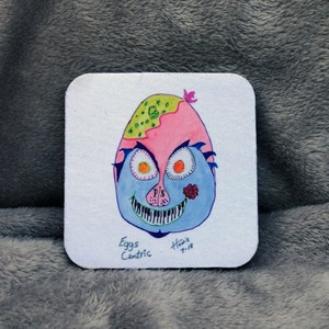 Eggs Centric - 3.5x3.5 Rubber Coaster -  Whimsical Art by Howard Stone (Howie)