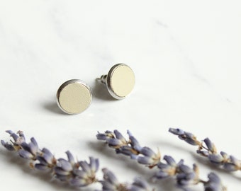 Circle 12 mm light beige stud earrings with surgical steel and reused leather by Jenny Aarrekangas