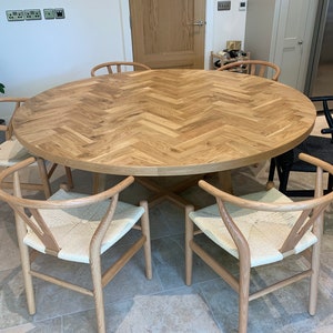 Round Herringbone dining table - Solid Oak - Wooden Legs - Bespoke orders available.