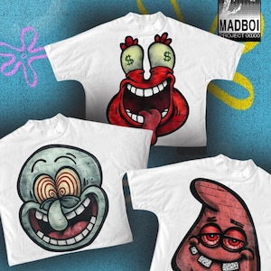 Könnte beinhalten: Weiße T-Shirts mit Cartoon-Charakter-Grafiken. Ein Shirt zeigt einen roten Charakter mit Dollarzeichen-Augen und einem breiten Grinsen. Ein anderes Shirt zeigt einen grünen Charakter mit Spiralaugen. Das dritte Shirt hat einen roten Charakter mit roten Augen.
