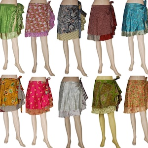 May include: Ten different silk wrap skirts in various colors and patterns. The skirts are all made of a soft, flowing fabric and have a unique, bohemian style.