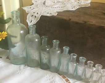 One shape 10 antique apothecary glass bottles, vintage medicine bottles, small jars, little vases vintage glass decor display chest decor