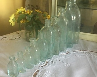 One shape 10 antique apothecary glass bottles, vintage medicine bottles, small jars, little vases vintage glass decor display chest decor