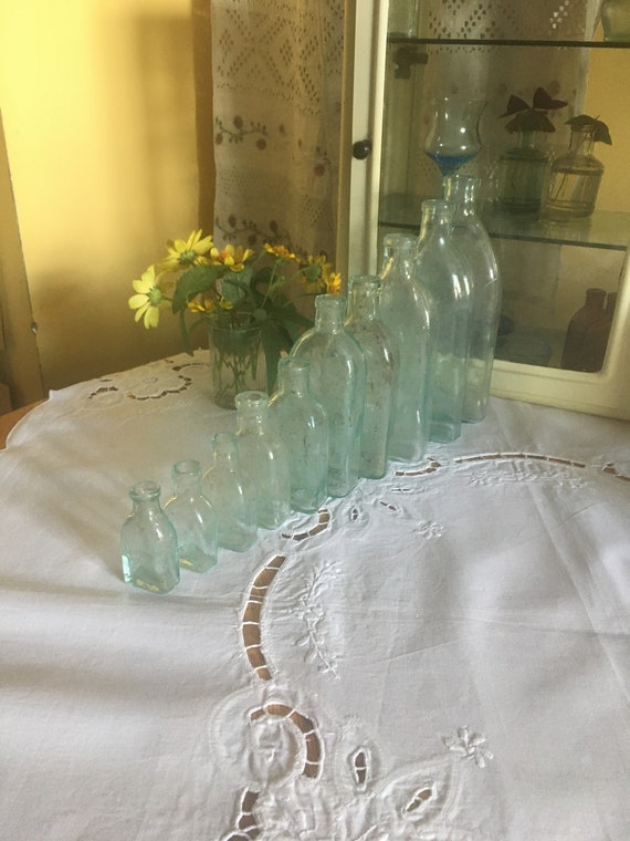 One shape 10 antique apothecary glass bottles, vintage medicine bottles, small jars, little vases vintage glass decor display chest decor