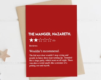 May include: A red Christmas card with a one-star review of "The Manger, Nazareth." The review reads: "Wouldn't recommend. The kid next door wouldn't stop crying and people in fancy dress kept turning up. Sounded like a large party, which went on all night. There was also a weird smell, like a mixture of a petting zoo and myrrh."