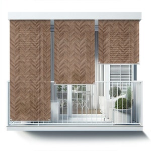 May include: Brown chevron patterned outdoor shades for a balcony. The shades are made of a woven material and are attached to a white metal railing.