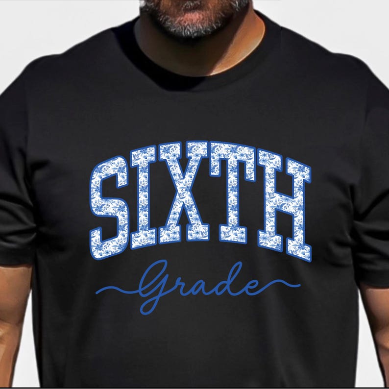 May include: A black short-sleeved t-shirt featuring the word SIXTH in large, block-style letters filled with a blue and white floral pattern, positioned above the word Grade written in a blue cursive script font across the center chest.