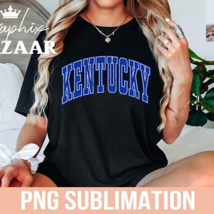 May include: Black t-shirt with the word "KENTUCKY" in blue, outlined in white. The text is arched across the front of the shirt. The image also includes the text "PNG SUBLIMATION" at the bottom.