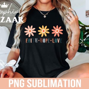 May include: Black t-shirt with three colorful flowers and the text "Faith. Hope. Love."