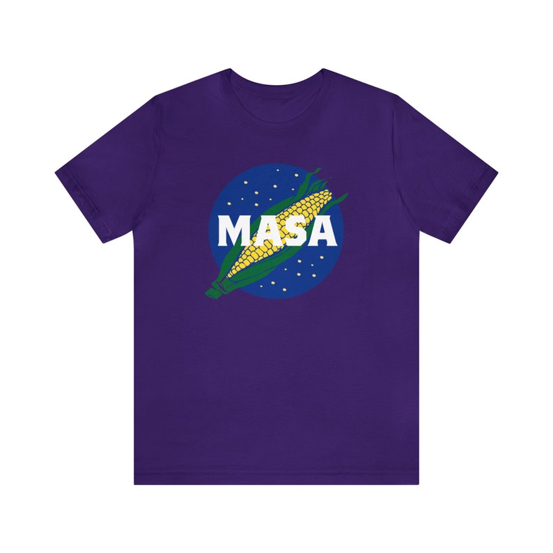 May include: Purple t-shirt with a white circle and a corn cob graphic. The circle has white dots and the text "MASA" in white letters.