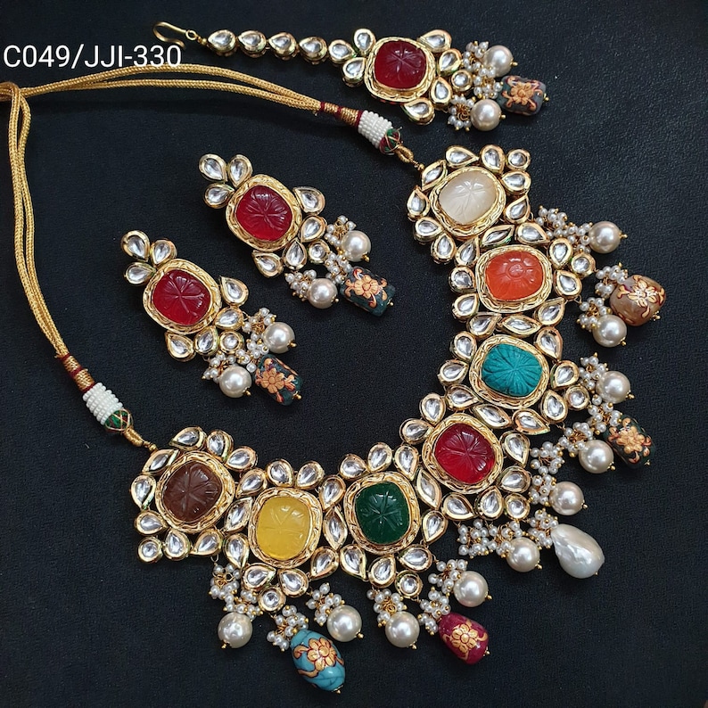 JP527 - Navratan kundan pendant with pearl chain. Comes with matching earings main image 1