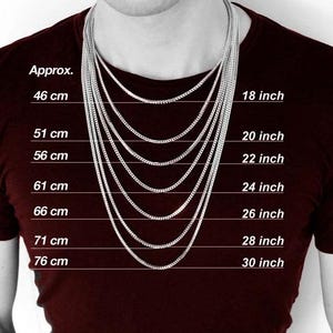 Pode incluir: Um guia de comprimentos de corrente de colar em polegadas e cent&iacute;metros. A imagem mostra um modelo usando uma variedade de comprimentos de corrente, que v&atilde;o de 18 polegadas a 30 polegadas. Os comprimentos s&atilde;o etiquetados em polegadas e cent&iacute;metros.