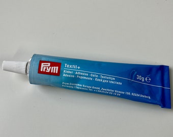 Lijm voor het lijmen van afgewerkte borduurringen, het lijmen van stof in borduurringen, Prym Textile +, textiellijm