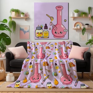 May include: A pink bong with a cute face is featured on a canvas and repeated on a lavender throw blanket. The blanket also displays honey jars, bees, and honey dippers. The artwork has a cartoon style and is displayed on a black couch with pink pillows.