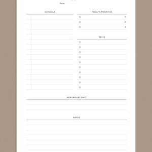 May include: A printable daily planner with sections for schedule, today's priorities, tasks, how was my day, and notes. The planner has a simple design with black text on a white background.