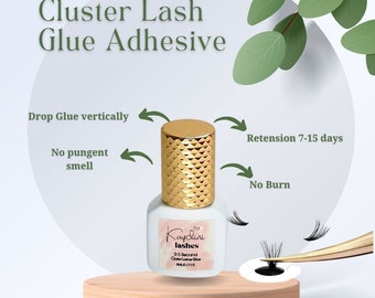 May include: A white bottle of Kaydini lashes cluster lash glue adhesive with a gold cap. The text on the bottle reads "2-3 Second Cluster Lash Glue". The image also includes text that says "Drop Glue vertically", "No pungent smell", "Retention 7-15 days", and "No Burn".