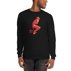 May include: A black long-sleeve t-shirt with a red and yellow silhouette of a devil figure with a tail.