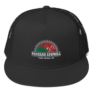 May include: Black trucker hat with a black mesh back. The front of the hat features an embroidered logo with a red sun, green trees, and gray mountains. The logo reads "Packard Sawmill Twin Peaks, WA."