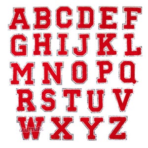 May include: Red felt alphabet letters with a silver glitter outline. Each letter is approximately 2 inches tall.