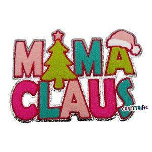 May include: A pink, green, and teal felt applique with silver glitter trim that reads "Mama Claus". A green felt Christmas tree with a yellow star is in the center of the applique. A pink felt Santa hat is on the right side of the applique.