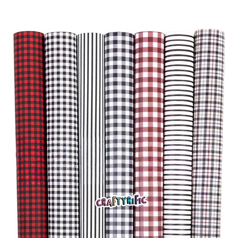 May include: A collection of rolled patterned craft paper rolls. The patterns include red and black buffalo check, black and white gingham, black and white stripes, black and white check, burgundy and white check, white and black stripes, and black and white plaid.