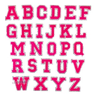 May include: A set of 26 iron-on letters in a varsity style font. The letters are pink with a silver glitter outline. The letters are uppercase and are arranged in alphabetical order.