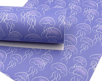 May include: Purple fabric with a white jellyfish pattern. The fabric is rolled up and the pattern is visible on both sides.
