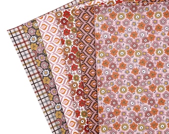 May include: A set of eight patterned wrapping paper sheets in various shades of brown, pink, and orange. The patterns include floral, paisley, and geometric designs.
