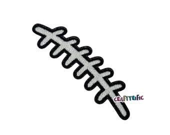 May include: White and black embroidered patch in a leaf design. The patch has a white leaf pattern with a black outline. The text "CRAFTYRIFIC" is in the bottom right corner.
