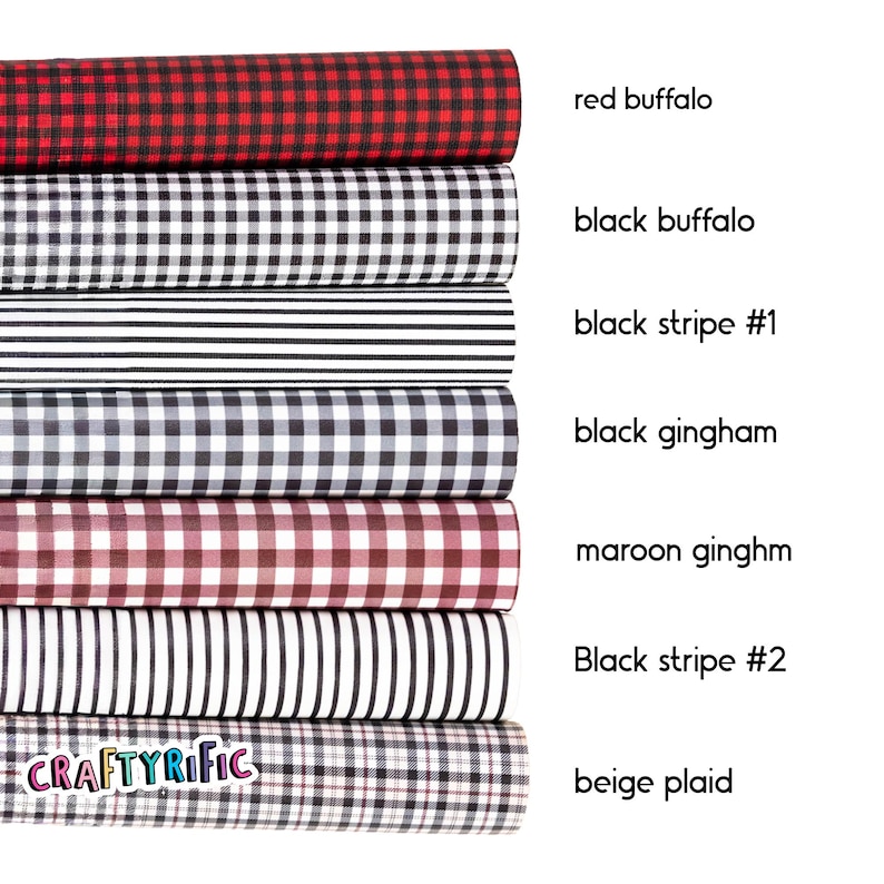 May include: A stack of fabric rolls with various patterns. The top roll is red buffalo plaid, followed by black buffalo plaid, black and white stripes, black gingham, maroon gingham, black and white stripes, and beige plaid. The text "CRAFTYRIFIC" is visible.