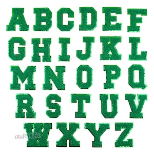 May include: Green felt letter patches in a block font style. The letters are A through Z.