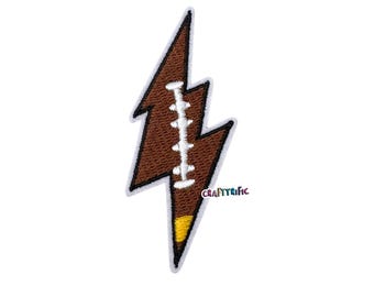 May include: A brown football-shaped lightning bolt patch with white stitching and a yellow accent. The patch has a white border and the text "Craftyrific" in the lower right corner.