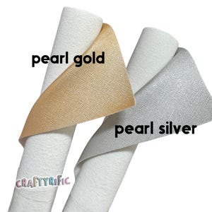 May include: Two rolls of white felt fabric with pearl gold and pearl silver ribbons. The text "pearl gold" and "pearl silver" are displayed on the image. The logo "CRAFTYRIFIC" is also visible.