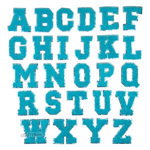 May include: A set of 26 turquoise blue felt letter patches in a block font style. The letters are arranged in alphabetical order from A to Z.