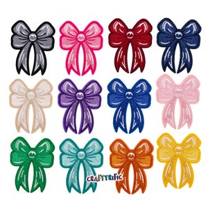 May include: A collection of twelve embroidered bow patches in various colors, including gray, pink, red, and blue. Each bow features a detailed design with a central knot and flowing ribbons, perfect for embellishing clothing or accessories.