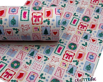 May include: A roll of Christmas-themed patterned paper featuring a repeating design of festive postage stamp-like squares. The squares contain images of Christmas trees, bows, stockings, and the text "Merry and Bright" and "Falala".