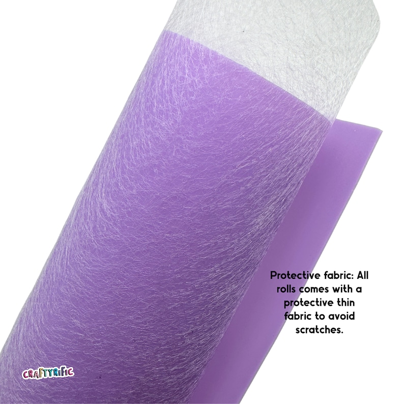May include: A roll of light purple tulle fabric with a white protective layer. The text "Protective fabric: All rolls comes with a protective thin fabric to avoid scratches." is printed on the fabric.