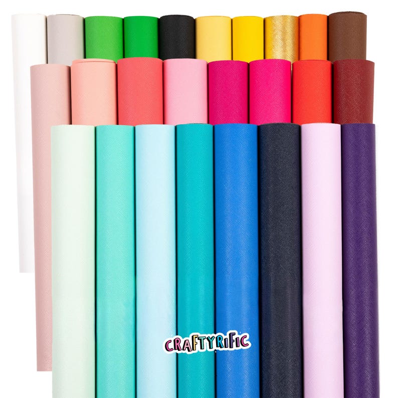 May include: A collection of colorful rolls of fabric in various shades, including pink, green, blue, and yellow. The rolls are neatly arranged, with the brand name "CRAFTYRIFIC" visible on the bottom right. The image showcases a variety of crafting materials.