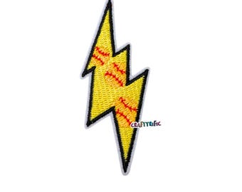 May include: Embroidered yellow lightning bolt patch with red stitching details. The patch has a black border and a white backing. The text "Craftyrific" is visible on the lower right side.