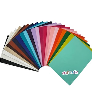 May include: A fan-shaped arrangement of 20 different colored felt sheets. The sheets are all the same size and are arranged in a rainbow pattern. The felt sheets are a popular crafting material.