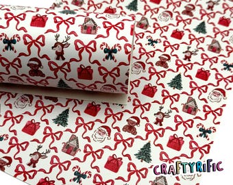 May include: White Christmas-themed patterned fabric featuring red bows, Santa faces, gift boxes, gingerbread houses, reindeer, teddy bears, and Christmas trees. The fabric is rolled up, showcasing the repeating festive design.