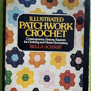 May include: A vintage book titled "Illustrated Patchwork Crochet" with a black background and gold lettering. The cover features a repeating pattern of colorful, crocheted flower shapes in shades of blue, orange, yellow, and pink on a white background.