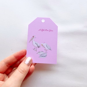 Set di 5 etichette regalo pellicano rosa