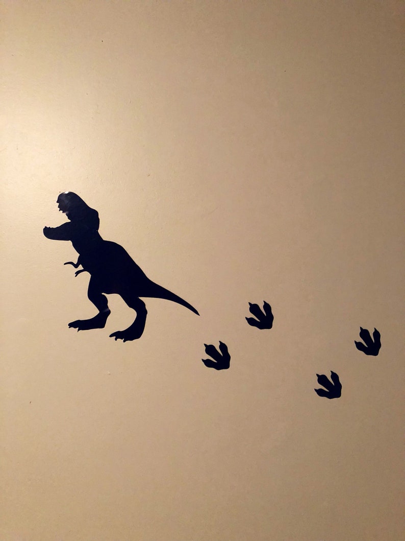 Dinosaur and footprint wall decals