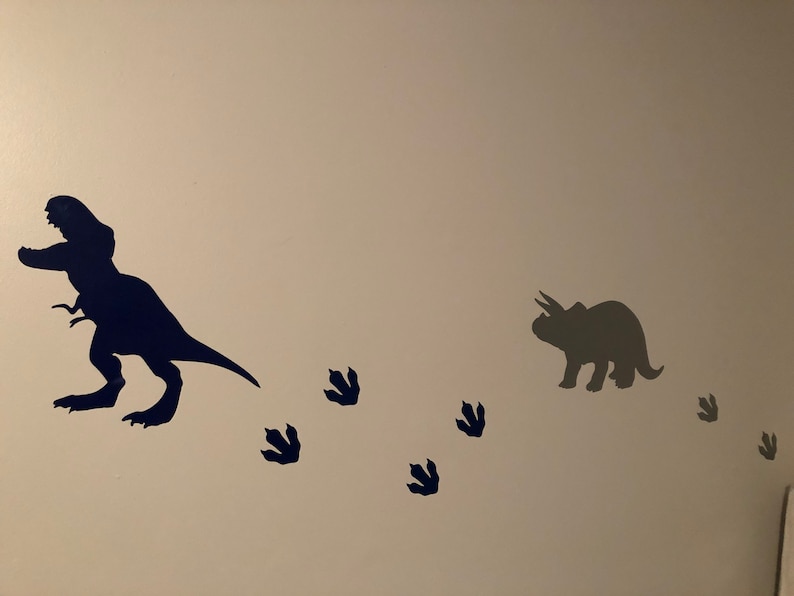 Dinosaur and footprint wall decals