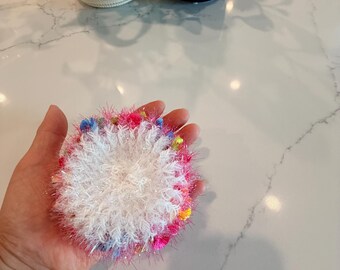 White sprinkle kitchen scrubbie.  Cleans your dishes without scratching. 100% polyester yarn from Korea.