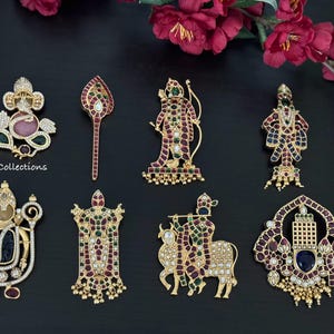 May include: Nine gold pendants with colorful gemstones and intricate designs. The pendants feature various Hindu deities and symbols, including Ganesha, a trident, and a temple.